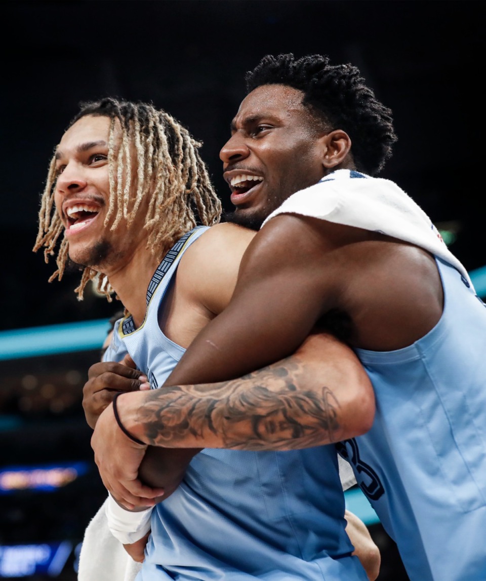 <strong>Memphis Grizzlies teammates Brandon Clarke (left) and Jaren Jackson Jr., celebrate on the bench during a victory over the Chicago Bulls on Monday, Jan. 17, 2022.</strong> (Mark Weber/The Daily Memphian)