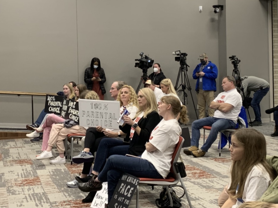 <strong>Parents and students attending Wednesday&rsquo;s meeting displayed their opinions against the mask mandate with posters and t-shirts.&nbsp;</strong>(Abigail Warren/The Daily Memphian)