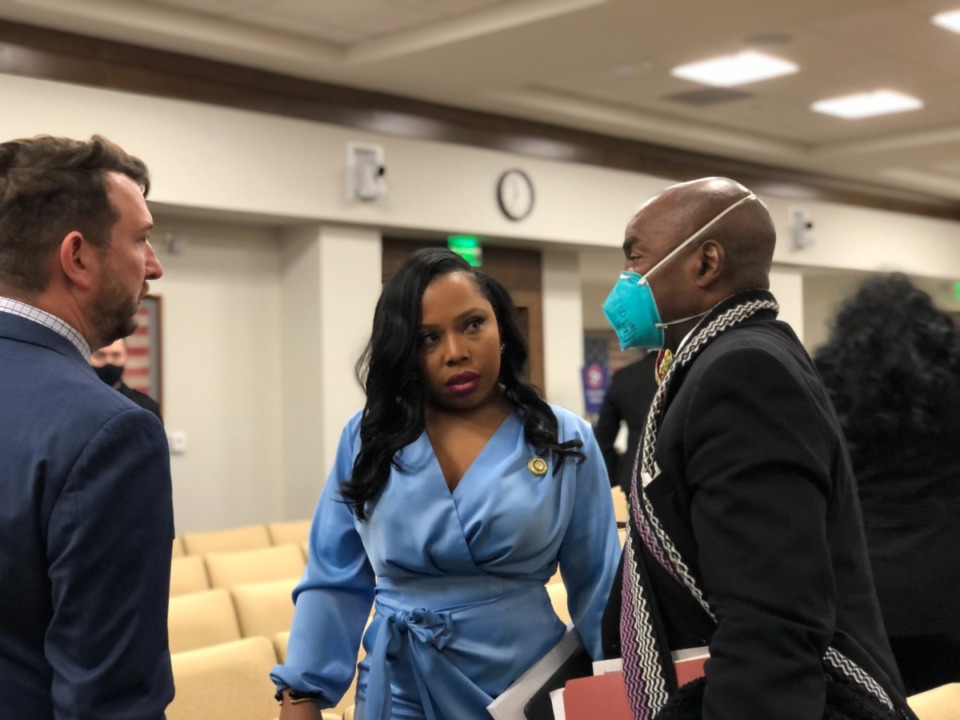 <strong>State Sen. Katrina Robinson speaks to fellow Memphis Democrat Rep. G.A. Hardaway (right) and Brandon Puttbrese, the Senate Democrats&rsquo; press secretary, Thursday, Jan. 20, following a hearing of the Senate Ethics Committee. The committee voted to recommend Robinson&rsquo;s expulsion.</strong> (Ian Round/Daily Memphian)