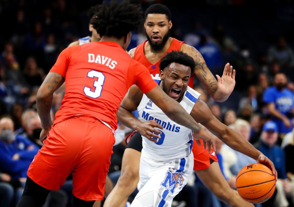 <strong>University of Memphis guard Alex Lomax (10) gets fouled during the Jan. 20, 2022, game against SMU.</strong> (Patrick Lantrip/Daily Memphian)