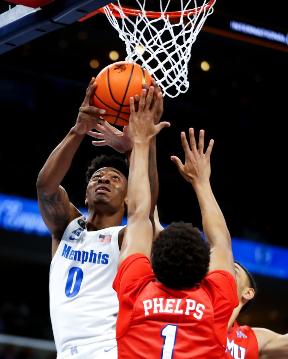 <strong>University of Memphis guard Earl Timberlake (0) goes for a layup during the Jan. 20, 2022, game against SMU in Memphis.</strong> (Patrick Lantrip/Daily Memphian)