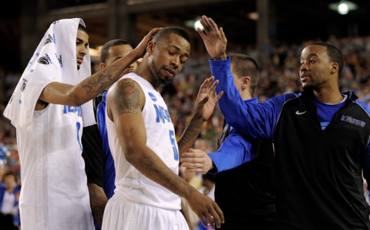 In this file photo, Memphis' Shawn Taggart, left, consoled teammate Antonio Anderson after Memphis lost to Missouri at the end of a men's NCAA college basketball tournament regional semifinal game in 2009. (AP file Photo/Mark J. Terrill)