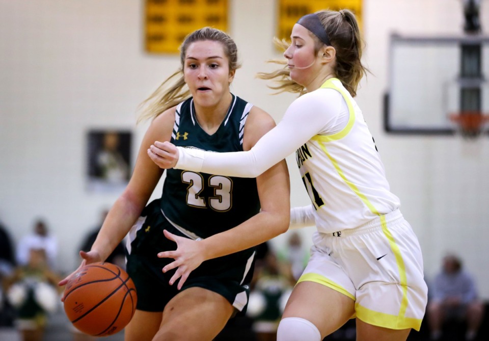 <strong>Briarcrest's Kayli Clarkson (23) drives to the basket against Hutchison on Jan. 21.</strong> (Patrick Lantrip/Daily Memphian)