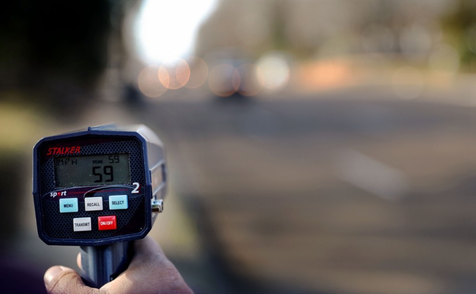 <strong>Ronnie Ramos, executive editor of The Daily Memphian, clocked a vehicle going almost 60 mph on Poplar Avenue on Friday, Jan. 21. Over four days and five locations, a radar gun recorded the speed of 240 drivers in Shelby County.&nbsp;</strong>(Patrick Lantrip/Daily Memphian)
