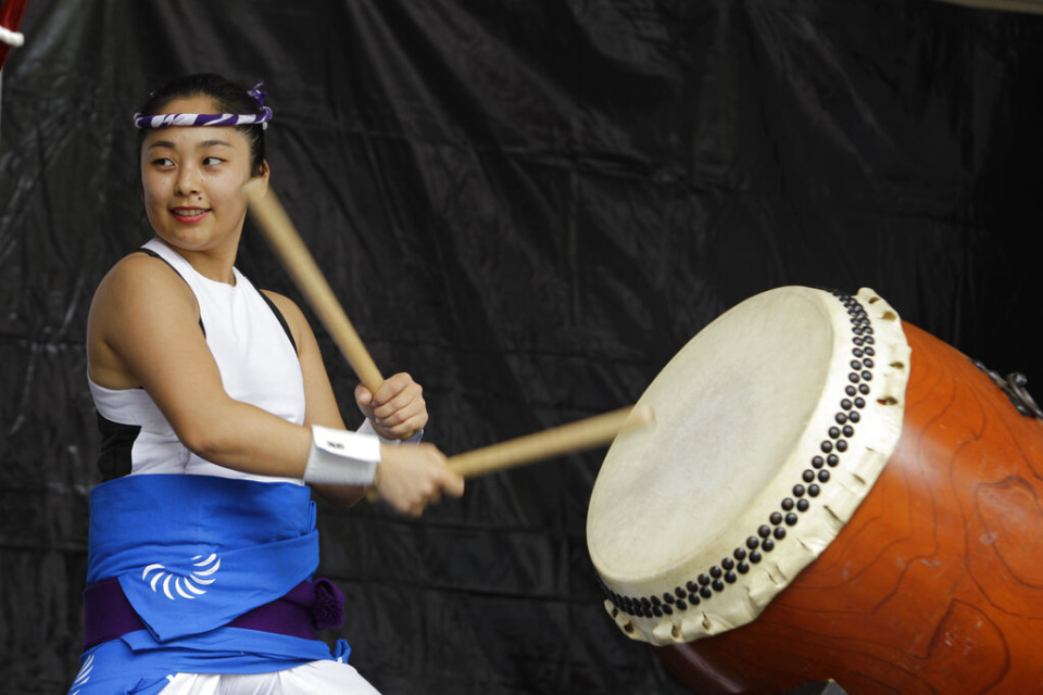 <strong>Sayalca Kikuch, a member of the Matsuriza Taiko drum group, performs at The Hatsume Fair held at the Delray Beach Morikami Museum and Japanese Gardens in Delray Beach, Fla., Sunday, March 20, 2011</strong>. (AP File Photo/J Pat Carter)