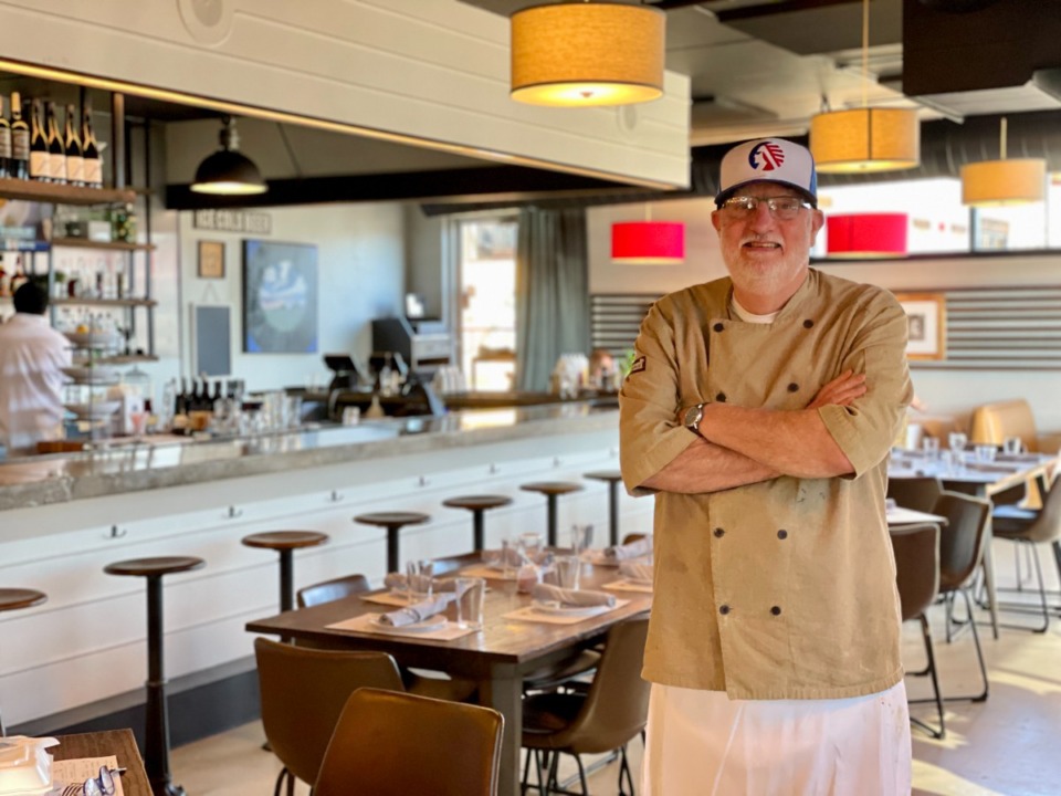 <strong>Mac Edwards, chef and general manager of The Farmer, which reopened in December 2021 with the same menu, serving up familiar classics.&nbsp;</strong>(Jennifer Biggs/ The Daily Memphian)