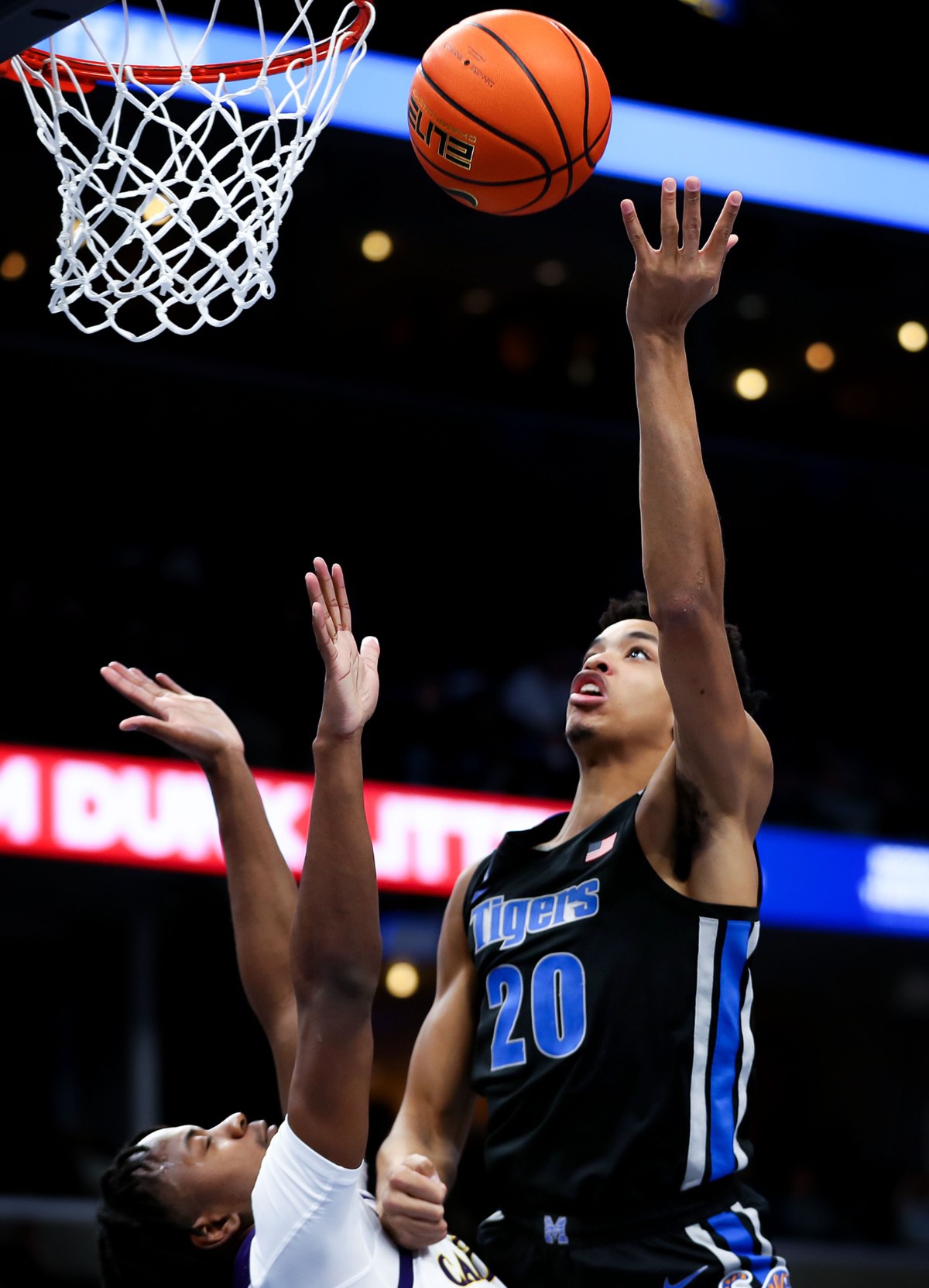 <strong>University of Memphis forward Josh Minott (20) goes for a layup on Jan. 27 against ECU.</strong> (Patrick Lantrip/Daily Memphian)