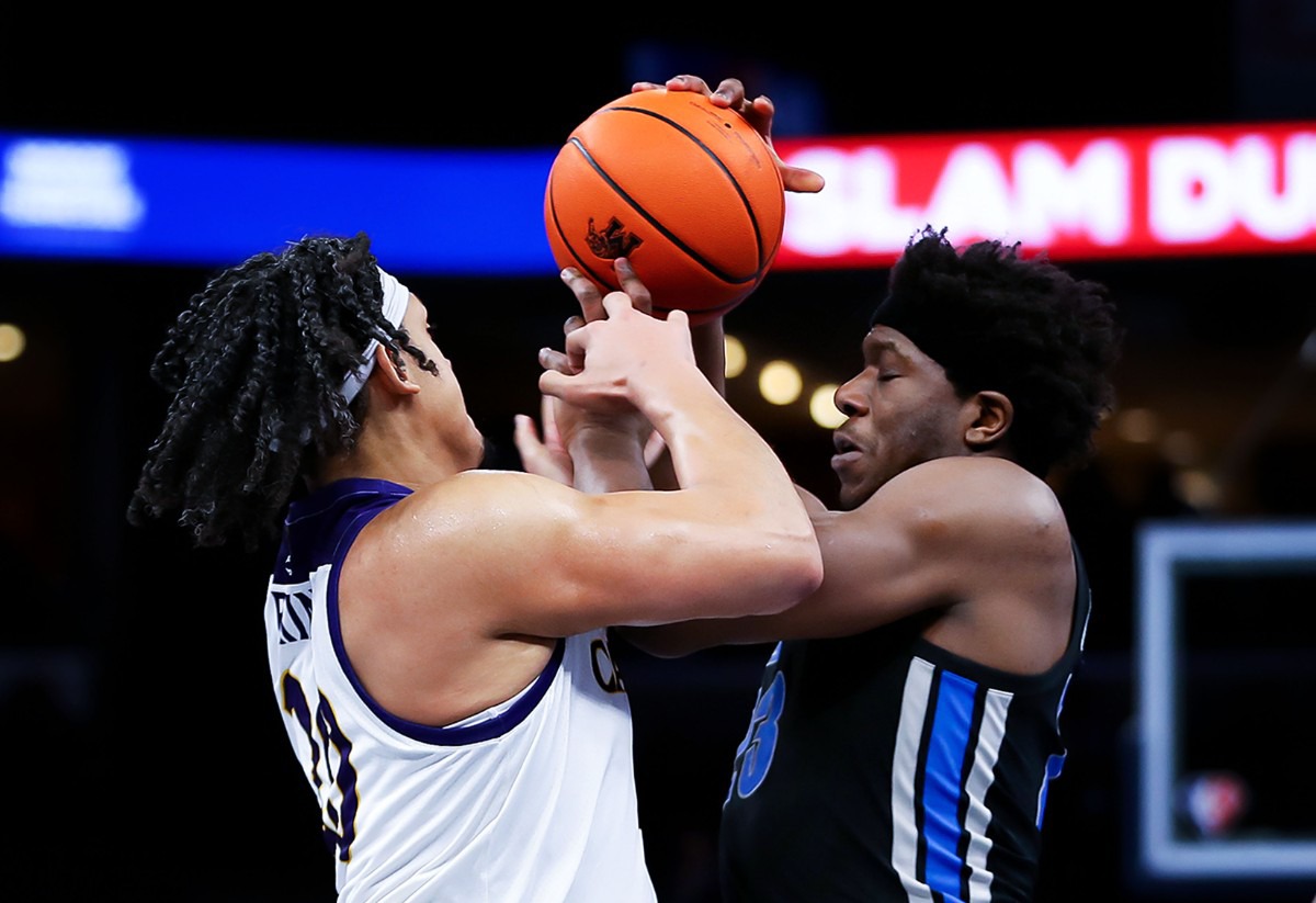 <strong>University of Memphis center Malcolm Dandridge (23) fights for a loose ball on Jan. 27 in the game against ECU.</strong> (Patrick Lantrip/Daily Memphian)