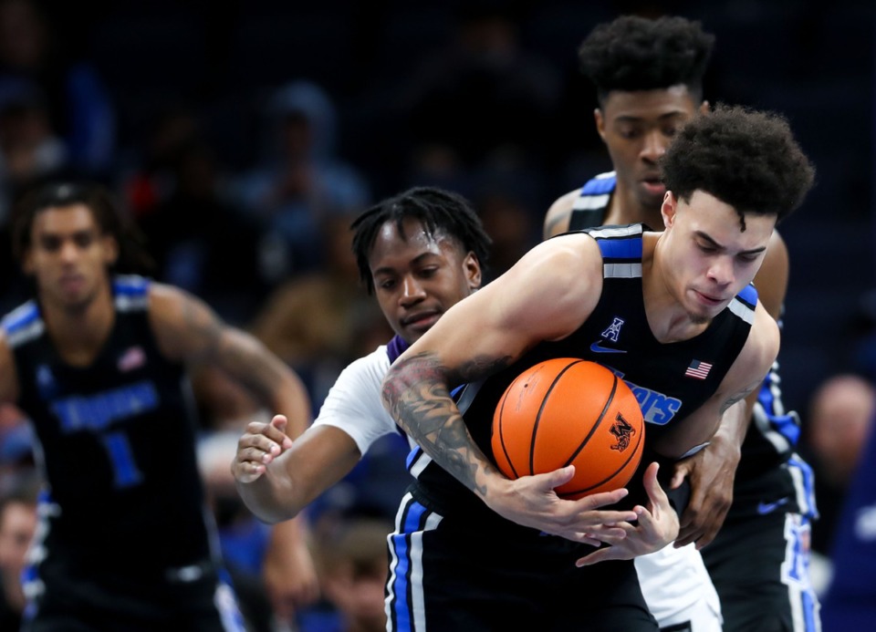 <strong>University of Memphis guard Lester Quinones (11) steals the ball from ECU on Jan. 27.</strong> (Patrick Lantrip/Daily Memphian)