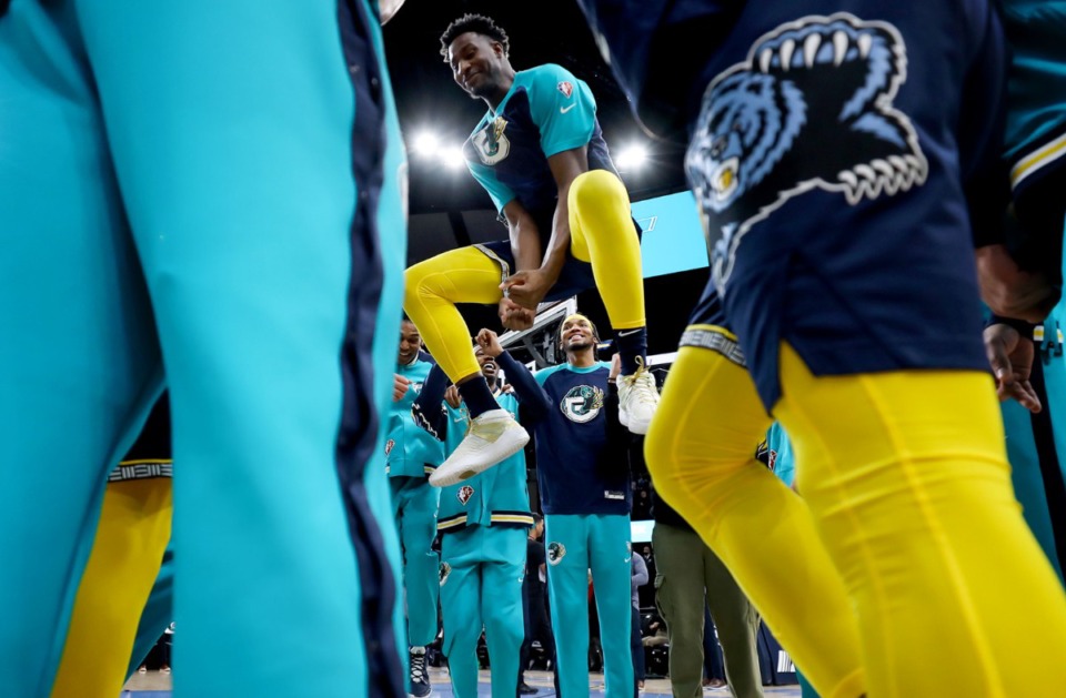 <strong>Memphis Grizzlies forward Jaren Jackson Jr. (13) gets hyped up with his teammates before the Jan. 28 game against the Utah Jazz.</strong> (Patrick Lantrip/Daily Memphian)