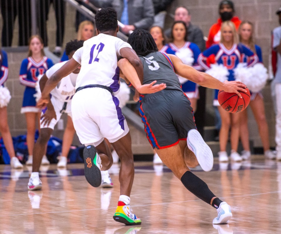 <strong>Zion Owens of CBHS guards MUS&rsquo; Curtis Givens III at CBHS on Friday, Jan. 28, 2022.</strong> (Greg Campbell/Special to The Daily Memphian)