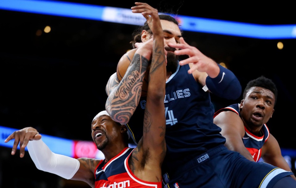 <strong>Memphis Grizzlies center Steven Adams (4) comes down with a rebound during a Jan. 29, 2022 game against the Washington Wizards.</strong> (Patrick Lantrip/Daily Memphian)