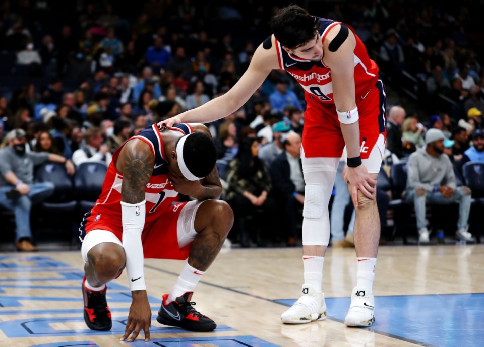 <strong>Washington Wizards forward Deni Avdija (9) checks on teammate Kentavious Caldwell-Pope (1) after he was elbowed in the mouth during a Jan. 29, 2022 game against the Memphis Grizzlies.</strong> (Patrick Lantrip/Daily Memphian)