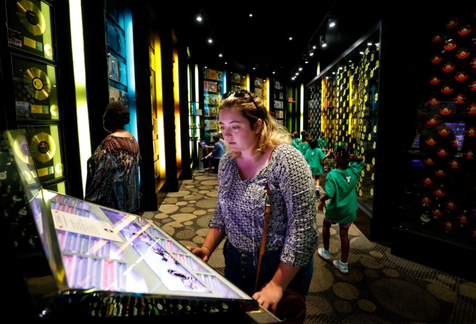 <strong>Madi Butler, 27, looks over a jukebox while touring the Stax Museum, Tuesday, July 30, 2019.</strong> (Mark Weber/Daily Memphian file).