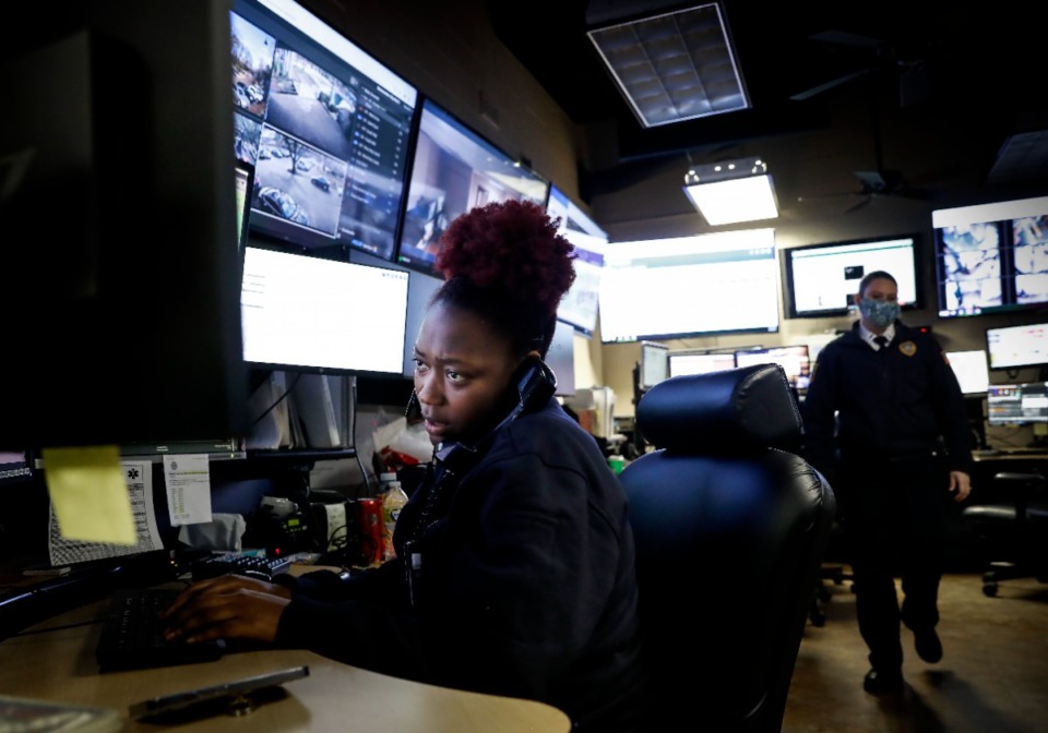 <strong>Germantown 911 call center dispatcher Bria Ford answers an emergency call on Wednesday, Feb. 2. Germantown has received funds to build a new emergency call center, freeing up space inside City Hall.</strong> (Mark Weber/Daily Memphian)