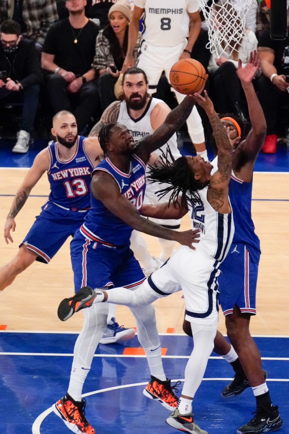 <strong>New York&rsquo;s Julius Randle, second from left, gets a hand on the ball as Grizzlies guard Ja Morant, second from right, goes for a layup on Feb. 2, 2022, in New York.</strong> (Seth Wenig/AP)