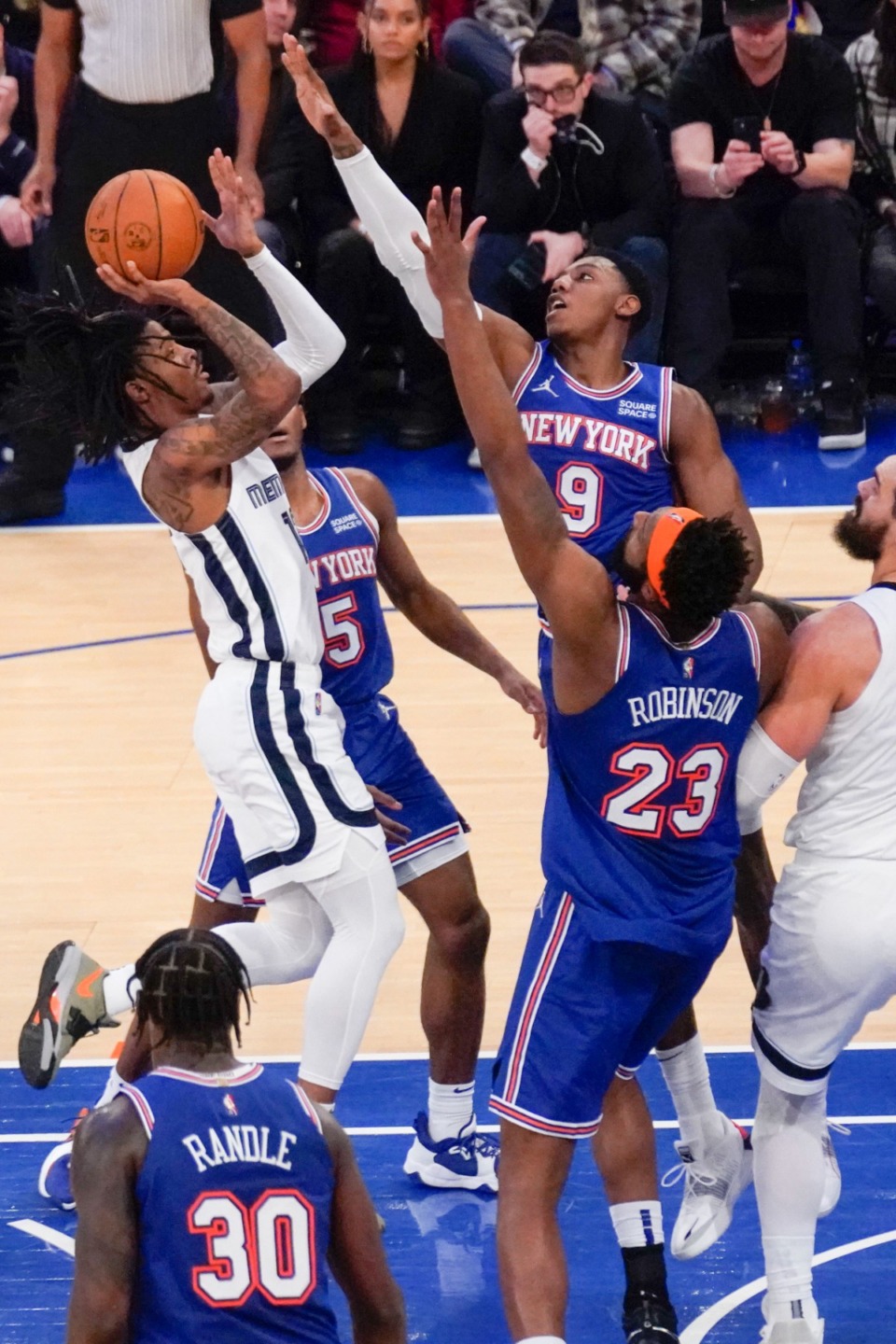 <strong>Grizzlies guard Ja Morant, left, goes up for a shot over multiple New York Knicks</strong>&nbsp;<strong>on Feb. 2, 2022, in New York.</strong> (Seth Wenig/AP)