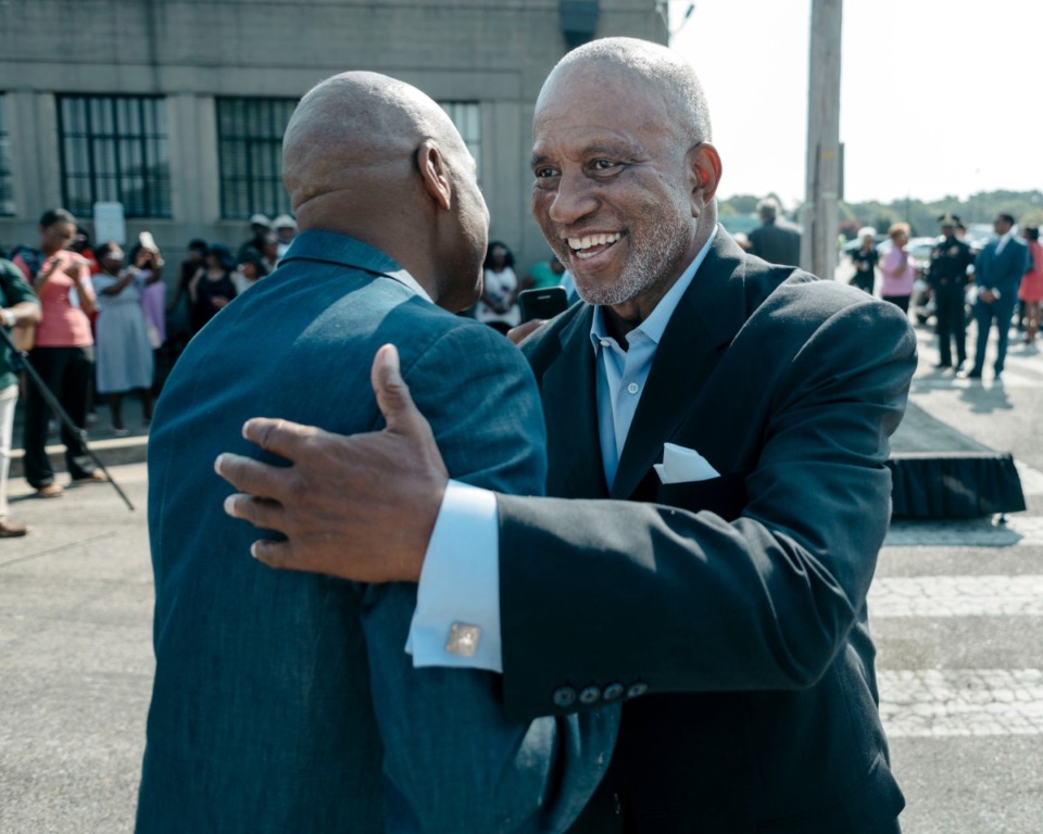<strong>Fred Jones (left) hugs a friend prior to a press conference held to unveil the naming of Fred Jones Way near the Liberty Bowl stadium in 2018.&nbsp;&ldquo;Some things are just a natural,&rdquo; he said Wednesday. &ldquo;Tennessee State (and) Jackson State in Memphis is a natural.&rdquo;&nbsp;</strong> (Houston Cofield/Daily Memphian file)