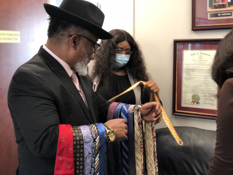 <strong>State Rep. Antonio Parkinson (D-Memphis) shows off some of the ties he&rsquo;s collected from lawmakers, General Assembly staffers and others for his eighth annual &ldquo;Ties for &lsquo;Terns&rdquo; event.</strong> (Ian Round/Daily Memphian)