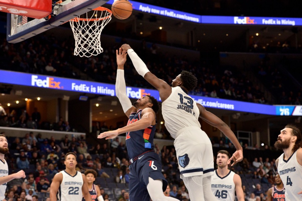<strong>Memphis Grizzlies forward Jaren Jackson Jr. (13) blocks a shot by Philadelphia 76ers forward Tobias Harris (12) on Dec. 13, 2021.&nbsp;Jackson, with 121, has more blocks than any other player in the NBA this season.</strong> (Brandon Dill/AP file)
