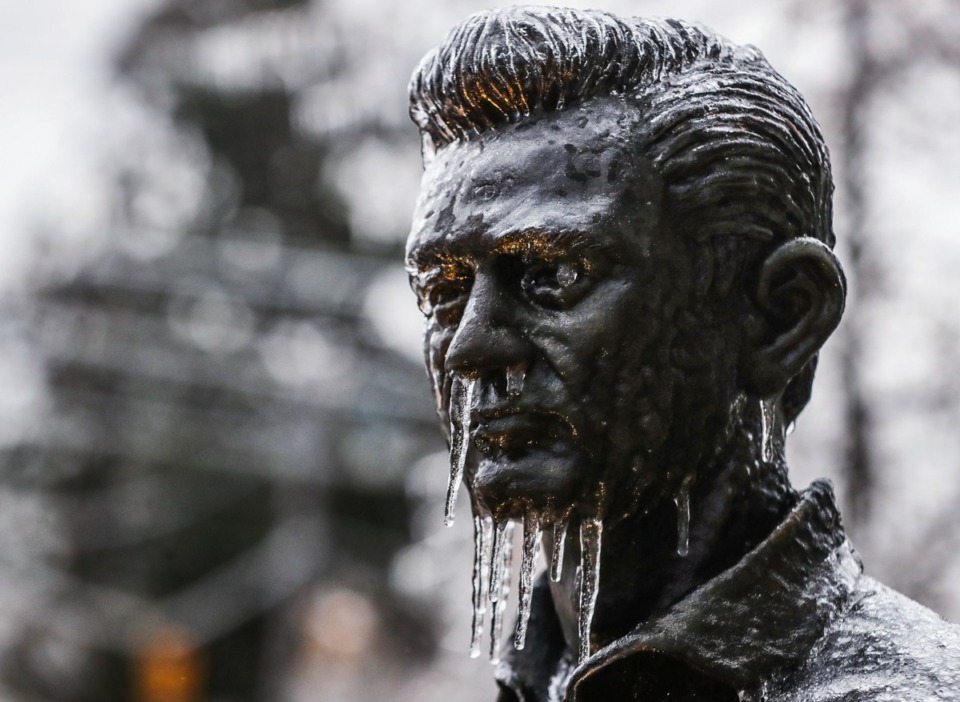 <strong>An icicle beard hangs from a statue of Johnny Cash in Midtown Memphis.</strong> (Patrick Lantrip/Daily Memphian)