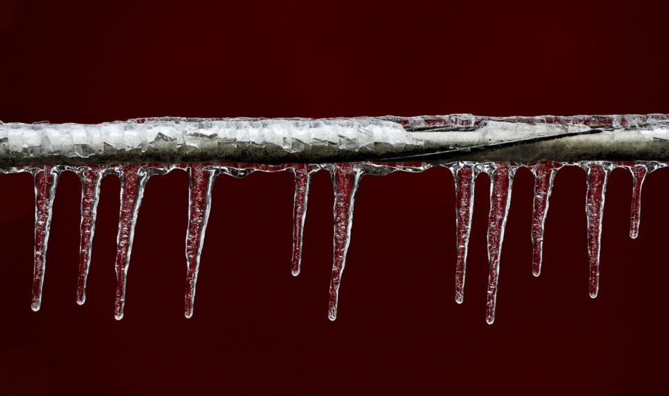 <strong>Icicles form on a fallen power line in South Memphis Feb. 4, 2022. The number to report downed lines and other emergencies is 901-528-4465. The number to report outages is 901-544-6500.</strong>&nbsp;(Patrick Lantrip/Daily Memphian)