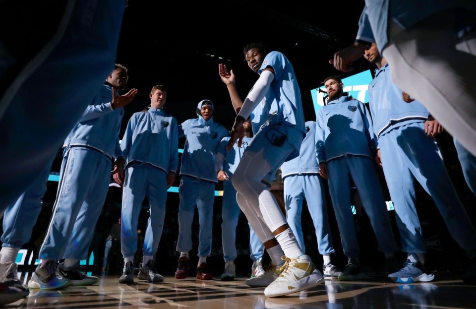 <strong>Memphis Grizzlies forward Jaren Jackson Jr. dances in the huddle before a Jan. 11, 2022 game against the Golden State Warriors at FedExForum.</strong> (Patrick Lantrip/Daily Memphian)