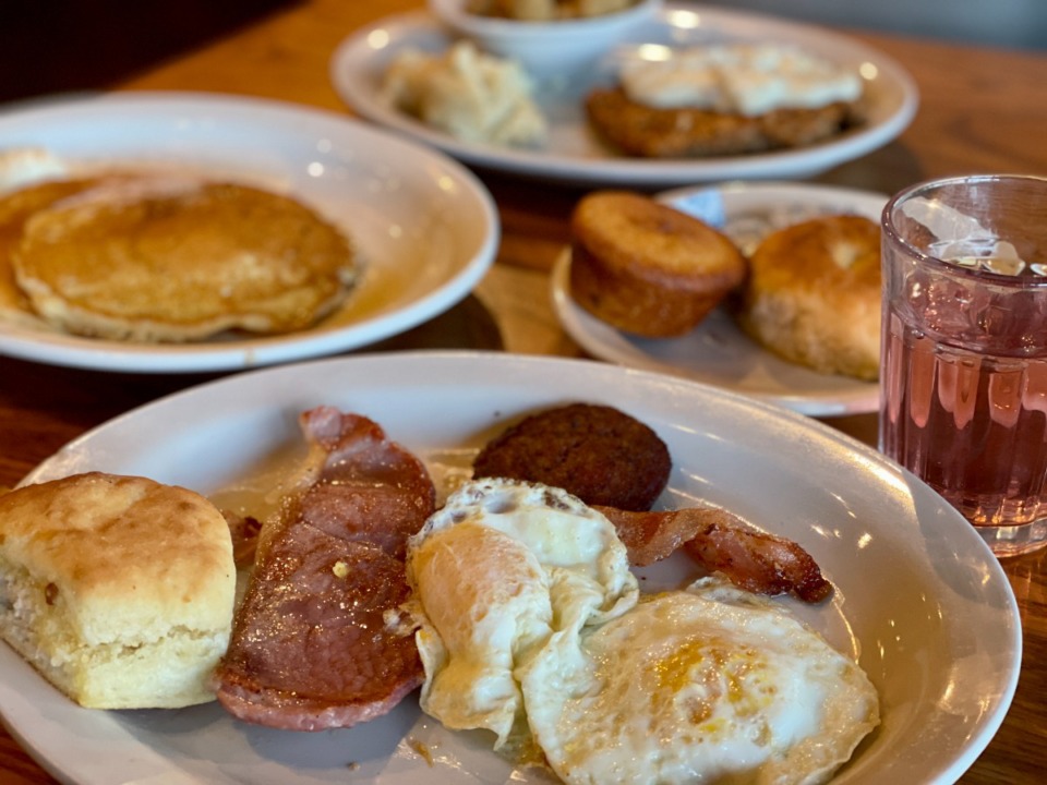 <strong>Cracker Barrel&rsquo;s Grandma&rsquo;s Sampler is served with a sugar plum mimosa and country fried steak (in the back).</strong> (Jennifer Biggs/Daily Memphian)