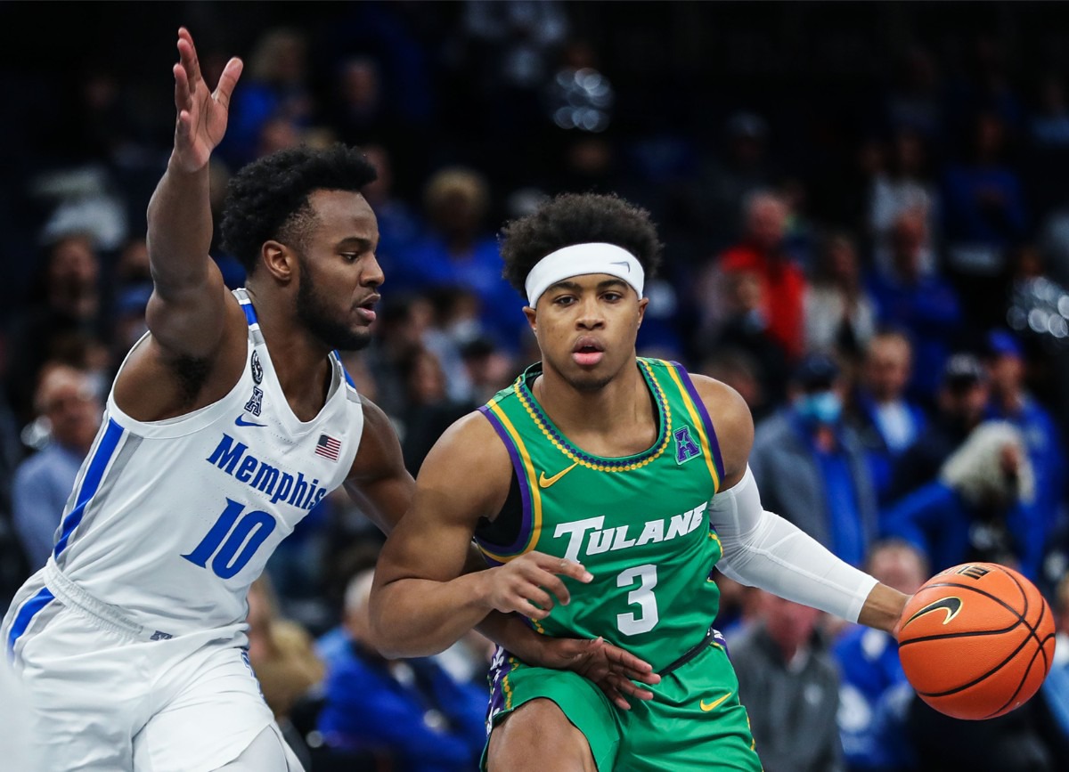 <strong>University of Memphis guard Alex Lomax (10) guards Tulane guard Jalen Cook (3) on Feb. 9 at FedExForum.</strong> (Patrick Lantrip/Daily Memphian)