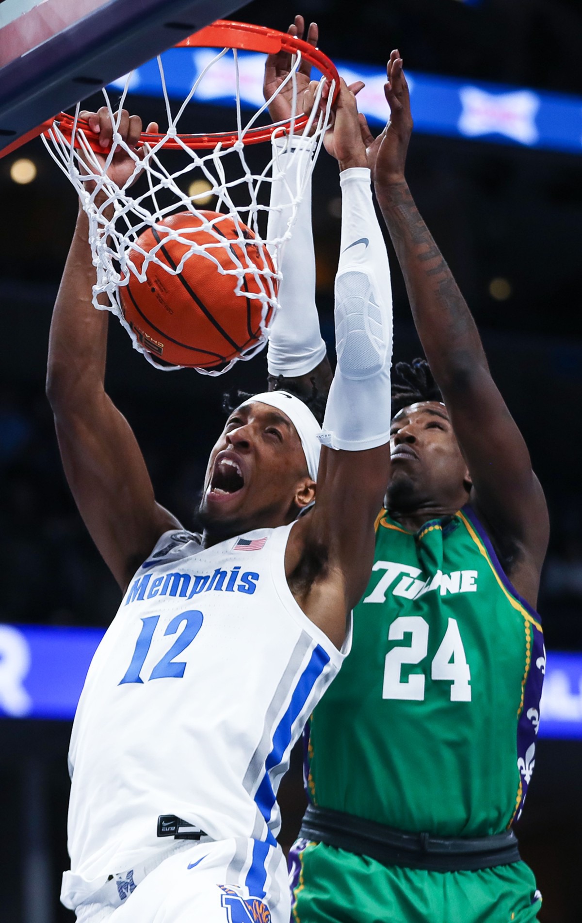 <strong>University of Memphis forward DeAndre Williams (12) dunks the ball against Tulane on Feb. 9.</strong> (Patrick Lantrip/Daily Memphian)