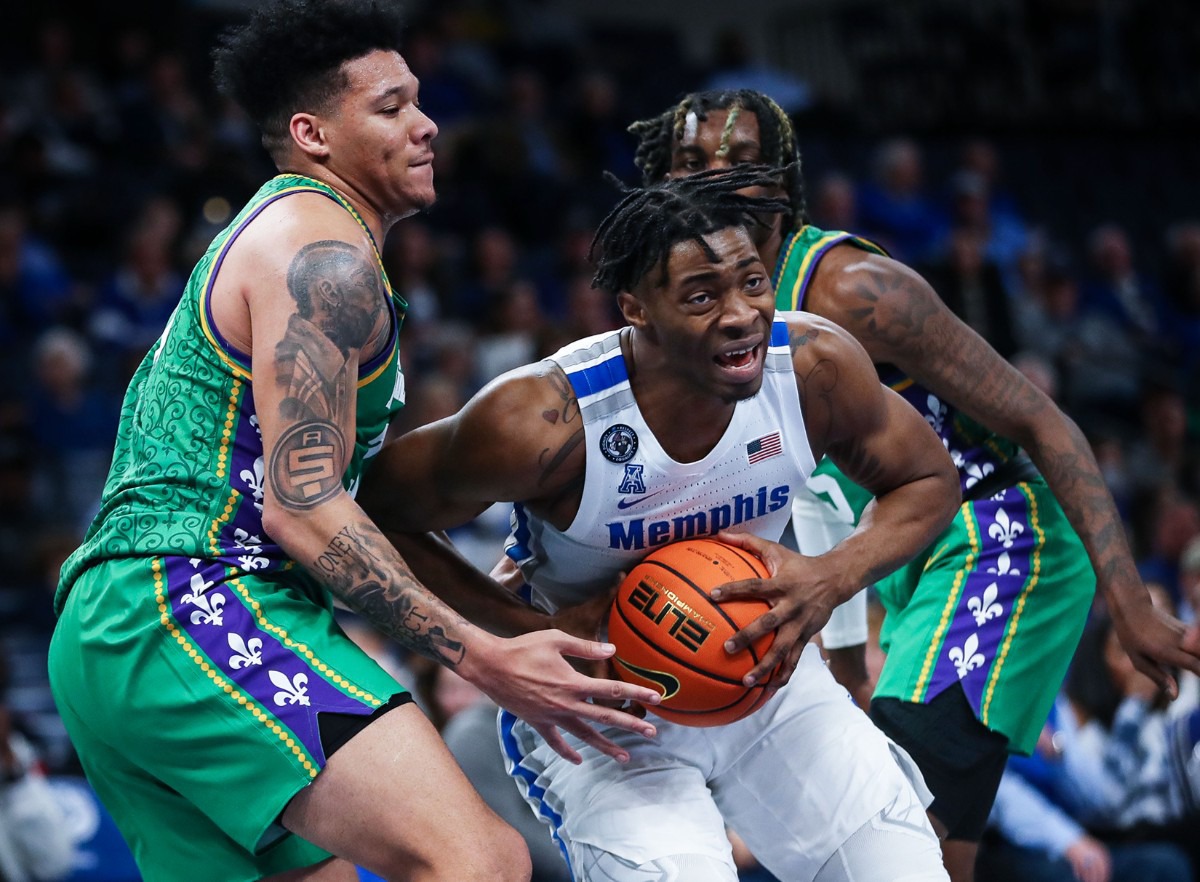 <strong>University of Memphis guard Earl Timberlake (0) drives to the basket on Feb. 9 against Tulane.</strong> (Patrick Lantrip/Daily Memphian)