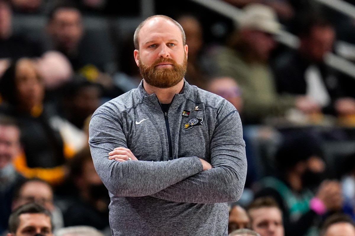 <strong>Memphis head coach Taylor Jenkins watches as the Grizzlies defeat the Detroit Pistons on Feb. 10, 2022.</strong> (Paul Sancya/AP)