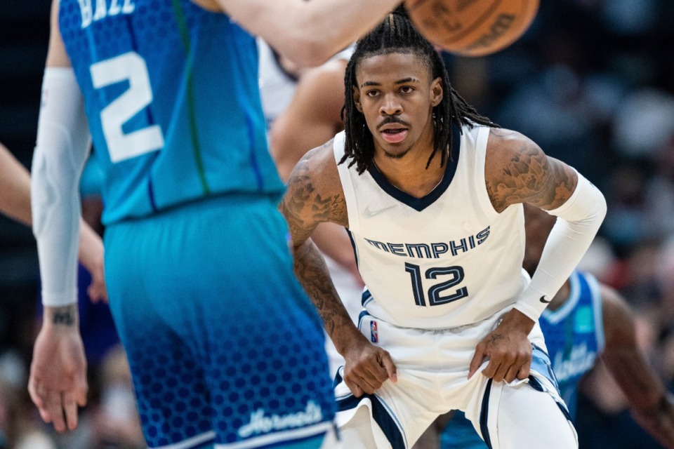 <strong>Ja Morant twisted his ankle in the Grizzlies&rsquo; win over the Charlotte Hornets after stepping on the foot of a camera operator under the basket.</strong> (AP Photo/Jacob Kupferman file)