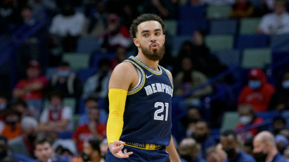 <strong>Memphis Grizzlies guard Tyus Jones (21) celebrates a 3-point basket during the second half of an NBA basketball game in New Orleans, Tuesday, Feb. 15, 2022</strong>. (AP Photo/Matthew Hinton)