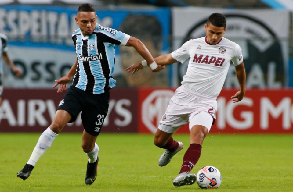 <strong>Luiz Fernando, seen at left playing for Brazil's Gremio in May 2021, will be joining 901 FC.</strong> (Silvio Avila/AP file)