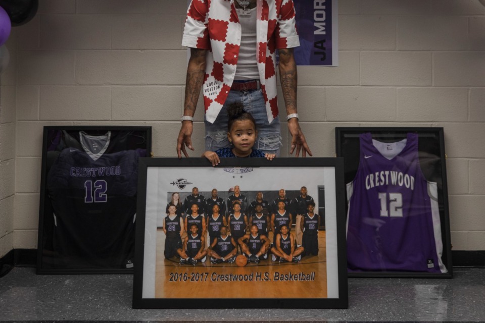 <strong>Ja Morant (red and white shirt) and Kaari Jaidyn Morant attend the ceremony to retire Morant&rsquo;s jersey at Crestwood High School on Dec. 7, 2021. (</strong>Micah Green/Sumter Item)