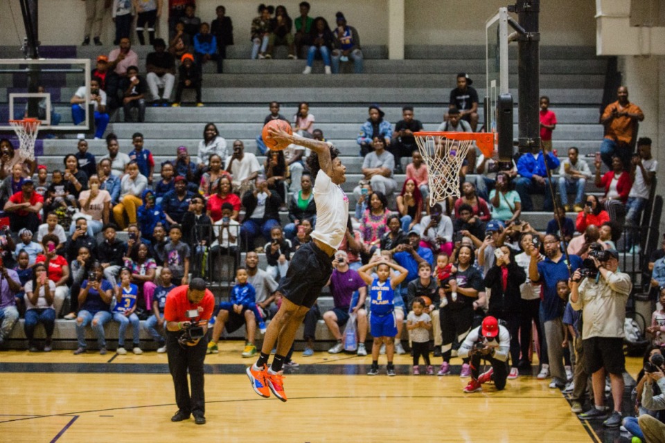 <strong>Ja Morant shows why Dalzell named a day after him, with a dramatic dunk at Crestwood High School, where he played prep basketball.</strong> (Micah Green/Sumter Item)