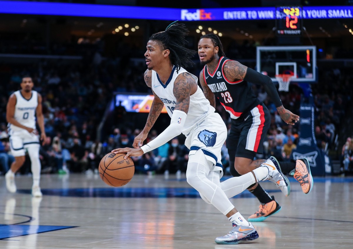 <strong>Memphis Grizzlies guard Ja Morant (12) drives the lane during the Feb. 16, 2022, game against the Portland Trail Blazers.</strong> (Patrick Lantrip/Daily Memphian)