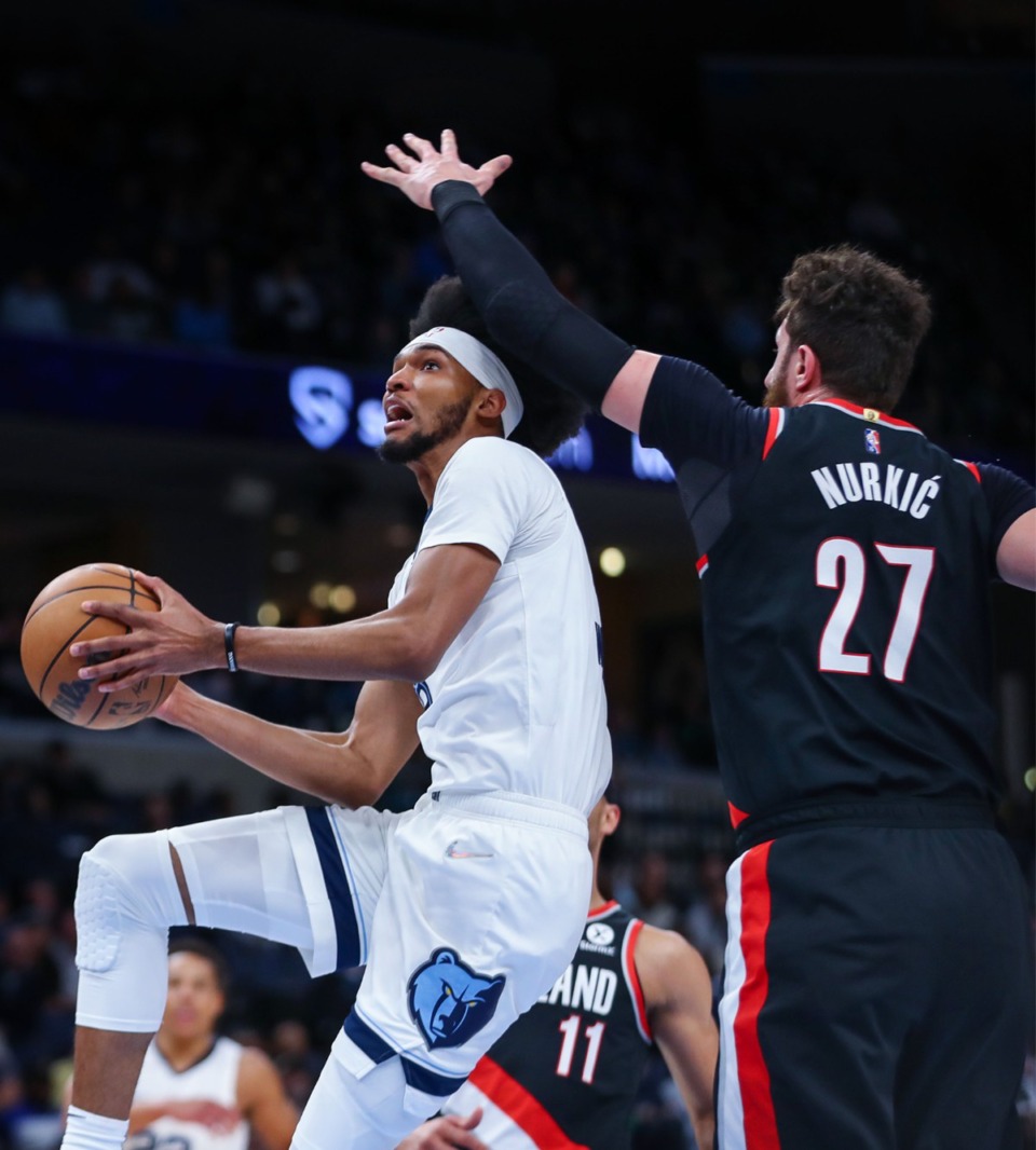 <strong>Memphis Grizzlies forward Ziaire Williams (8) goes for a layup during the Feb. 16, 2022, game against the Portland Trail Blazers.</strong> (Patrick Lantrip/Daily Memphian)