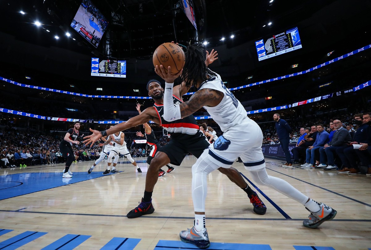 <strong>Memphis Grizzlies guard Ja Morant (12) inbounds the ball during the Feb. 16, 2022, game against the Portland Trail Blazers.</strong> (Patrick Lantrip/Daily Memphian)