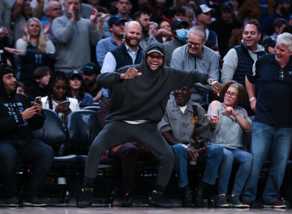 <strong>Tee Morant, the father of Memphis Grizzlies guard Ja Morant, dances on the sidelines of the Feb. 16, 2022, game against the Portland Trail Blazers.</strong> (Patrick Lantrip/Daily Memphian)
