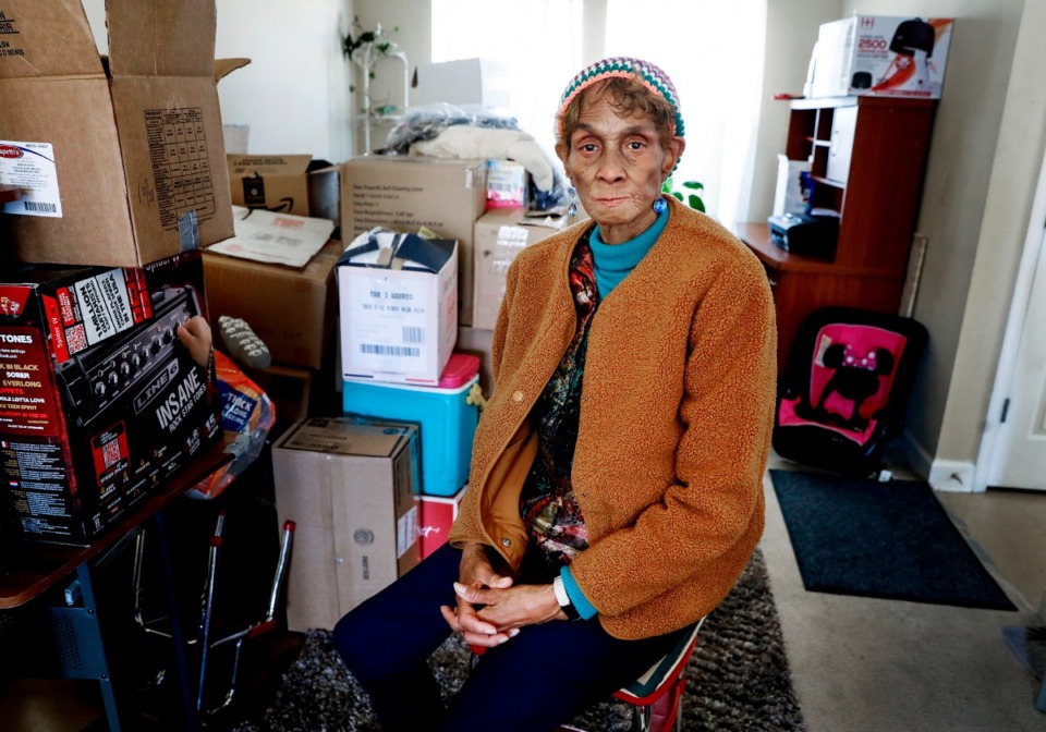 <strong>Rita Franklin, 68, sits among boxes packed with her belongings on Monday, Jan. 24, 2022, in her dining room. Most remaining public housing in Memphis is being privatized by HUD's RAD program. It is forcing residents to move out of subsidized housing for months so it can be rehabbed. Franklin will likely not be able to return to her Uptown home she&rsquo;s lived in for over 15 years.</strong> (Mark Weber/The Daily Memphian)