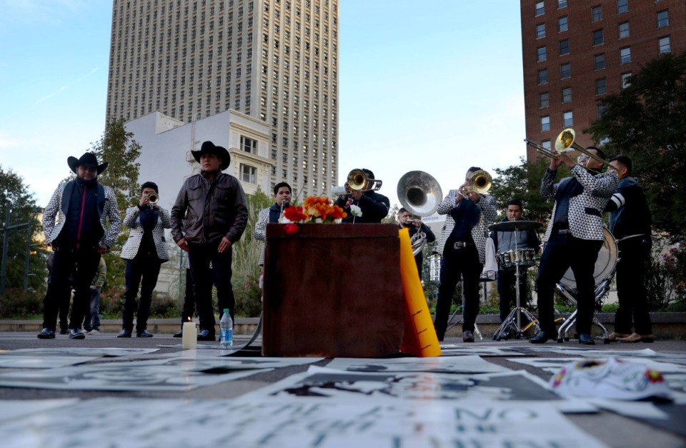 <strong>A band performs around a makeshift coffin outside of City Hall Nov. 2, 2021 to honor those who have died and those killed by violence in Memphis.</strong> (Patrick Lantrip/Daily Memphian file)