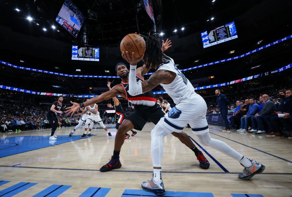 <strong>Memphis Grizzlies guard Ja Morant (12) inbounds the ball during a Feb. 16, 2022 game against the Portland Trail Blazers</strong>. (Patrick Lantrip/Daily Memphian)