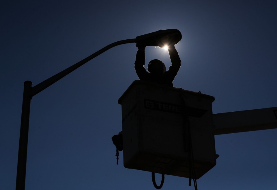 <strong>Workers with Northcentral Electric install LED streetlights in recently annexed areas of Olive Branch. But some of the new citizens prefer starlight and say no thanks.</strong>&nbsp;(Patrick Lantrip/Daily Memphian)