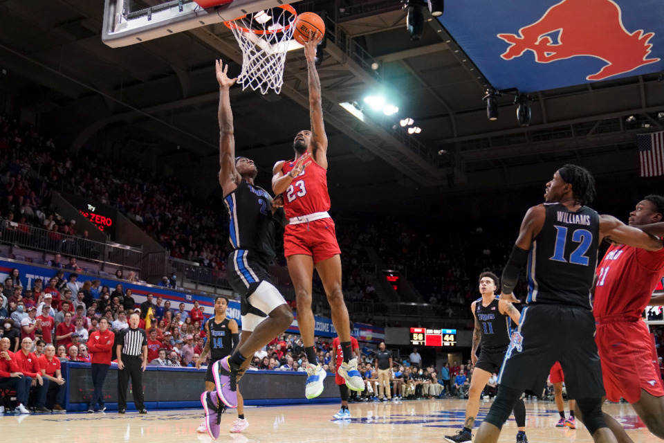 <strong>Memphis center Jalen Duren, left, goes up to block a shot attempt by SMU guard Michael Weathers (23) as DeAndre Williams (12) and Jahmar Young Jr. (21) look on in the second half of an NCAA college basketball game in Dallas, Sunday, Feb. 20, 2022.</strong> (AP Photo/Tony Gutierrez)