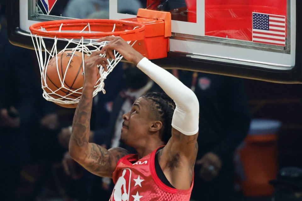 <strong>Memphis Grizzlies' Ja Morant dunks the ball during the first half of the NBA All-Star basketball game, Sunday, Feb. 20, 2022, in Cleveland.</strong> (AP Photo/Ron Schwane)