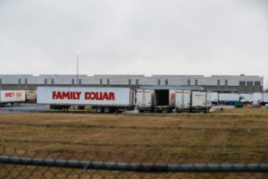 <strong>Trucks are parked outside the Family Dollar Distribution Center at 1800 Family Dollar Drive in West Memphis, Monday, Feb. 21. FDA officials said a consumer complaint prompted inspection of the facility.</strong> (Mark Weber/The Daily Memphian)