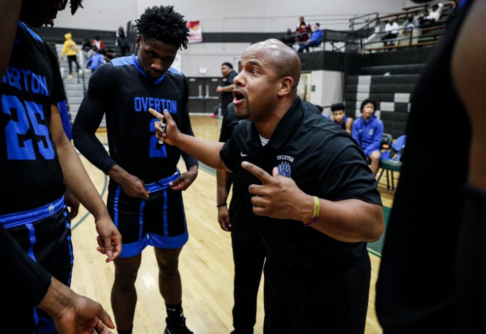 <strong>Overton head coach Shelvie Rose (middle) talks to his players before the game against Whitehaven on Monday, Feb. 21, 2022.</strong> (Mark Weber/The Daily Memphian)
