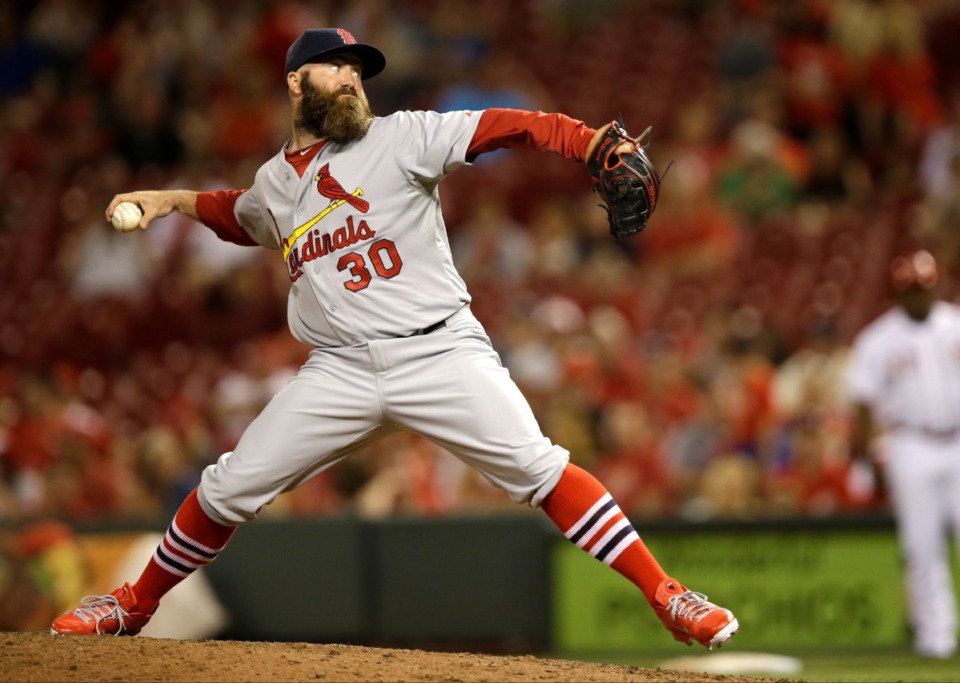 <strong>Jason Motte&rsquo;s professional career included a stint with the St. Louis Cardinals. The relief pitcher threw against the Cincinnati Reds on May 24, 2014.</strong> (Al Behrman/Associated Press file)